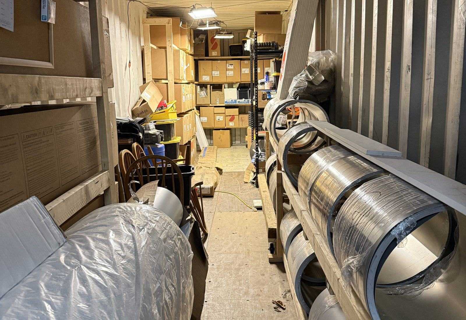 Inside our forming truck — the seamless gutter machine and aluminum coils